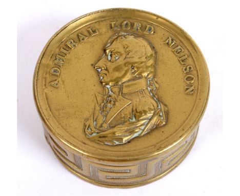 19TH CENTURY - HORATIO NELSON, 1ST VISCOUNT NELSON, K.B. (1758-1805). A BRASS CIRCULAR SNUFF BOX circa 1805 with bas-relief p