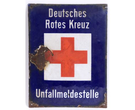SECOND WORLD WAR - A GERMAN 'DEUTSCHES ROTES KREUZ UNFALLMELDESTELLE' ENAMEL WALL SIGN of slightly convex form, 40cm x 30cm.