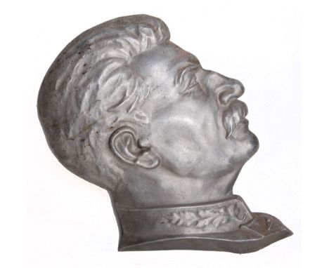 RUSSIA - JOSEPH STALIN (1878-1953). A SOVIET TWICE LIFE-SIZE BAS RELIEF PORTRAIT PLAQUE  in cast aluminium, 56cm high.