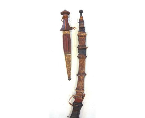 EDGED WEAPONS - A SUDANESE SWORD MANDING late 19th century, complete with scabbard; together with a Sudanese dagger, (2).  Pr