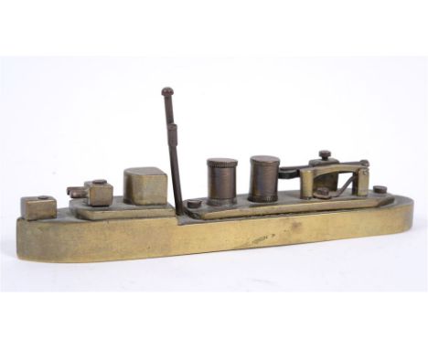 GREAT WAR - A  FINE SOLID BRASS SHIP'S WORKSHOP MADE 'TRENCH ART' TABLE LIGHTER  in the form of a battleship, with rotating g