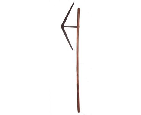 EDGED WEAPONS - A LARGE ZULU OR SWAZI CEREMONIAL AXE  late 19th or early 20th century, of traditional form, with a steel poin