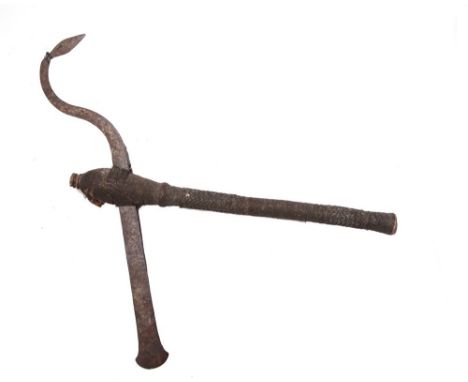 EDGED WEAPONS - AN AFRICAN FIGHTING OR CHIEF'S AXE  the wooden shaft completely covered in copper wirework decoration, the bl