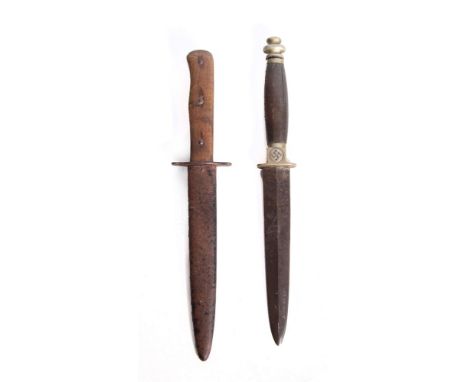 SECOND WORLD WAR - AN SS GERMAN BOOT KNIFE  of regulation production specification, the wooden hilt scales inscribed 'Krim 19