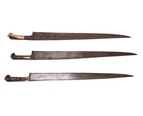 EDGED WEAPONS - THREE INDIAN KHYBER KNIVES  19th century, of traditional form and construction, with horn and ivory grip scal