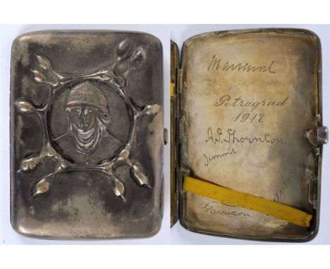 RUSSIA - AN UNUSUAL RUSSIAN SILVER 'PAN-SLAV' CIGARETTE CASE  the front decorated with an embossed portrait within an organic