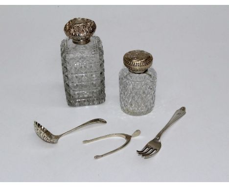 A selection of silver comprising a wishbone set of sugar tongs, approximate weight 9.2gm, a sugar sifter spoon, approximate w