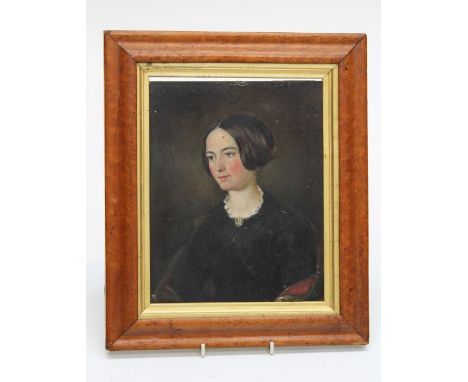 Early 19th century English School, half length portrait of a young woman, seated, wearing a lace trimmed black gown. Oil on p