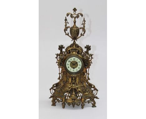 J Leemans, a circa 1900 ornate cast brass cased mantle clock, with ivorine Arabic dial. 57cm high