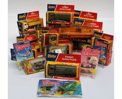 A large selection of Dinky boxed vehicles to include various army transport, breakdown vehicles, police helicopters. All in b