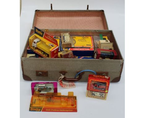 A large interesting collection of assorted die cast vehicles, including Dinky, Matchbox, Solido and others contained in a lar