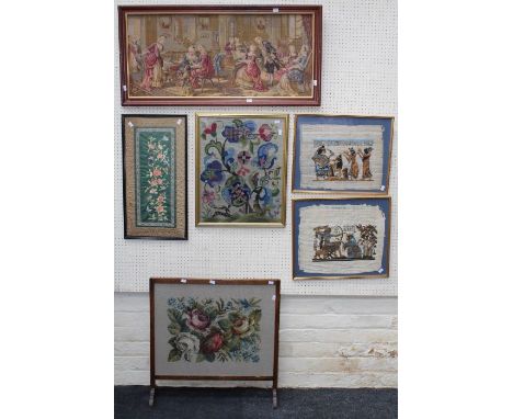 Two Egyptian papyrus tourist pieces, a 1950's gros point woolwork set firescreen, a small loom woven tapestry after in antiqu