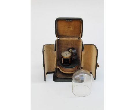 An Edwardian E R Watts and Sons Air Meter, on a wood base, beneath glass dome in a fitted case