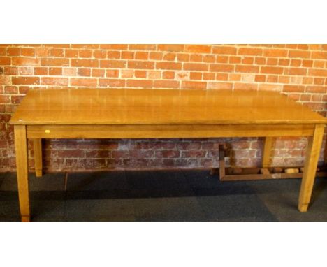 A light oak rectangular office table, 203cm wide, 90cm deep, 73cm high.