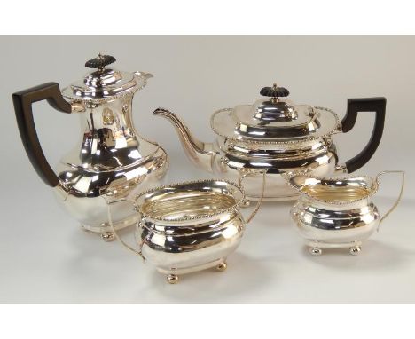 A silver plated London shape four piece tea set, comprising teapot, hot water jug, sugar basin and milk jug, with bead border