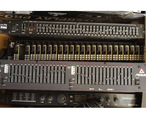 A Peavey twin channel graphic equaliser, an Alesis Microverb and three patch bays, a Stageline graphic equaliser and Behringe
