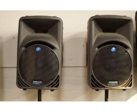 A pair of Mackie SRM 450 Active Sound reinforcement monitor system speakers, upon Stagg speaker stands.