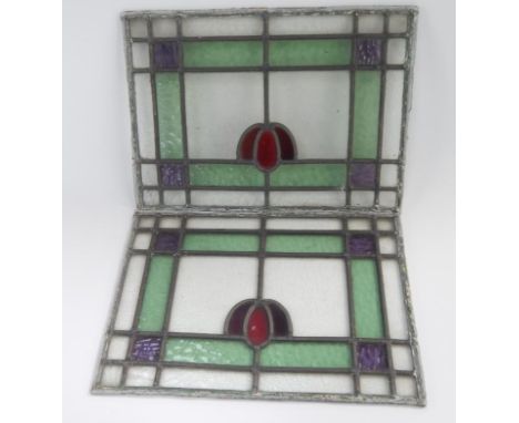 A pair of stained glass leaded light panels, 28cm x 38cm.