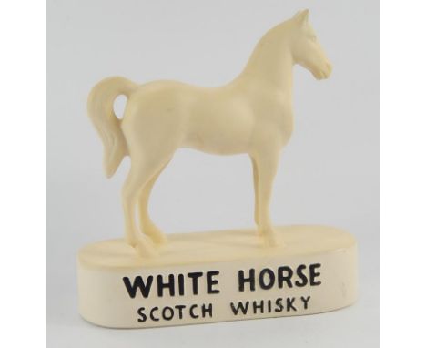 Breweriana, a White Horse Scotch Whisky Kelabolo Ware advertising figure, 22cm high.