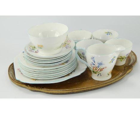 A Shelley Wild Flowers pattern part tea service, comprising four cups and six saucers, six tea plates, a bread and butter pla