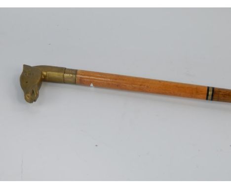   A brass horse headed collapsible walking stick, in three sections with rubber foot, total length 90cm.