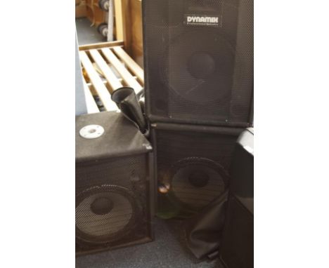 Three Dynamix Professional audio PA speaker cabinets.