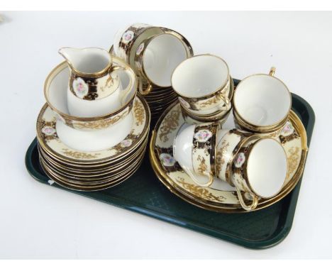   A Noritake part tea service, comprising cups, saucers, milk jug, sugar bowl, etc, (1 tray).