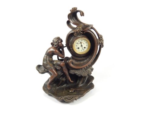 An early 20thC Continental spelter figural mantel clock, depicting lady with cresting wave, the dial having floriate painted 