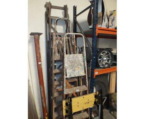 THREE SETS OF LADDERS PLUS A WORK BENCH