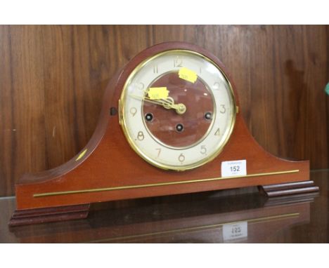 A MANTLE CLOCK