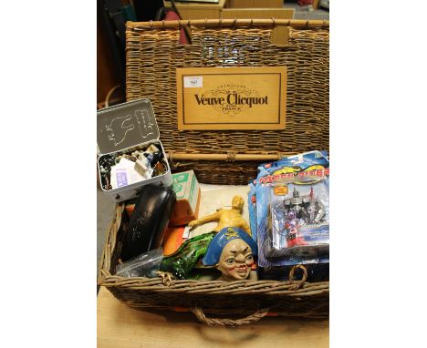 A WICKER BOX OF COLLECTABLES TO INCLUDE MARBLES, A DINKY FORKLIFT TRUCK, COSTUME JEWELLERY ETC