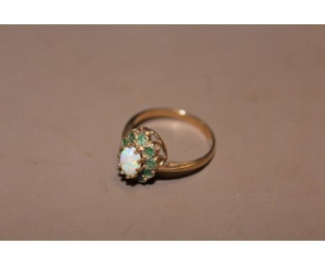 A 9CT GOLD EMERALD AND OPAL DRESS RING