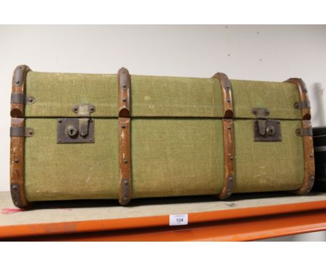 A BANDED STEAMER TRUNK