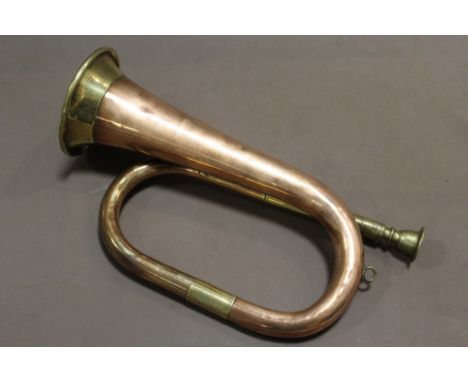 A VINTAGE COPPER AND BRASS HUNTING HORN