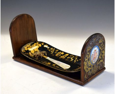 Victorian walnut brass and Sevres-style ceramic adjustable bookrack, a toleware stuffers tray and a mother-of-pearl letter op
