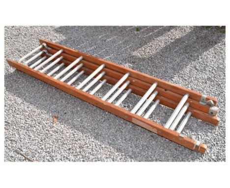 Wood and aluminium triple extending ladder  