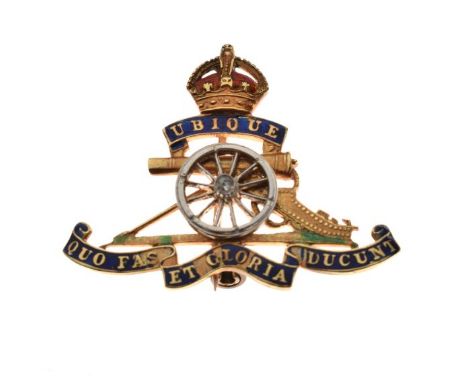 Royal Artillery diamond set and enamel decorated regimental brooch having revolving wheel, stamped 18, 6.1g gross approx