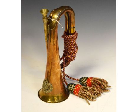 Brass and copper bugle with shield and banner of 'Western Australian University Regiment', with silk tassels, 29cm long  