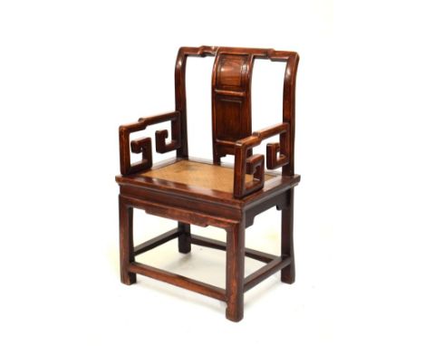 Chinese provincial stained pine and elm chair with panel back between open scroll arms on woven cane seat and square sectione