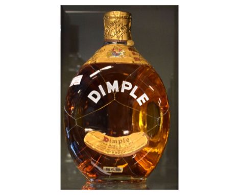 Wines &amp; Spirits - Vintage Haig 'Dimple' 70% proof blended Scotch Whisky with original net cover, 26 and 2/3 fluid ounces 