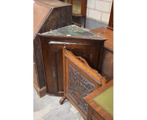 An 18th Century oak flat front hanging corner cupboardAnd a carved oak fire screen. (2) 