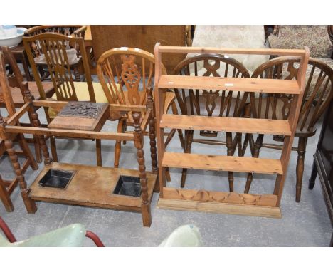 A 1930's oak stick stand with bobbin turned uprights and a pine wall rack. (2) 