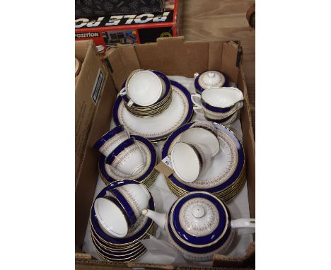 A Royal Worcester Regency tea and dinner service to include teapot, cups, saucers, side plates, sugar basin, milk jugs etc., 