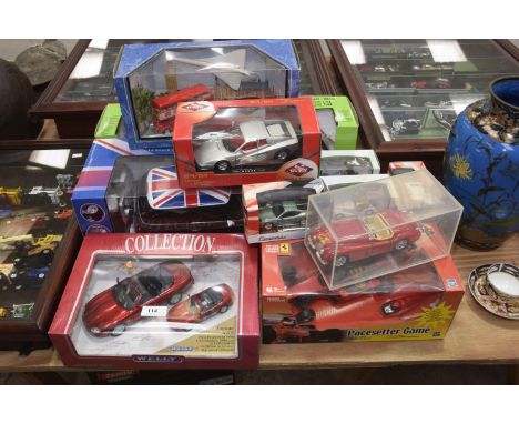 A Collection of boxed die cast models, Agricola tractor and trailer, Corgi Great Britain Big Ben taxi and bus, Mini cooper an