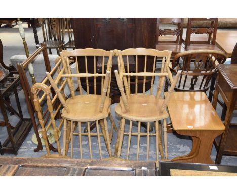 A 'G' plan style nest of three tables, a set of four beechwood kitchen chairs, two towel rails and a lamp standard. (8) 