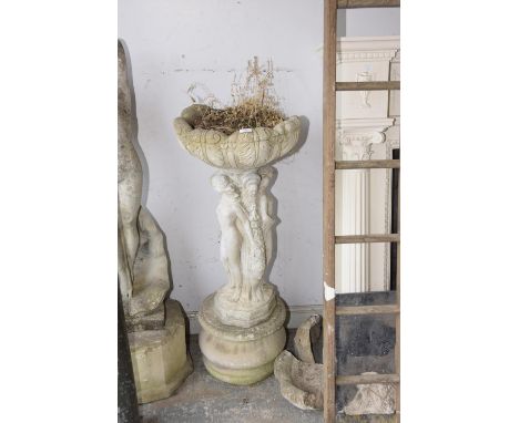 A Reconstituted stone figural garden planter (a/f ) 