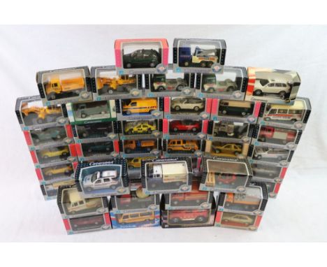 A collection of approx 48 boxed hongwell Cararama diecast toy cars and trucks to include Mercedes Benz, Land rover, VW, BMW..