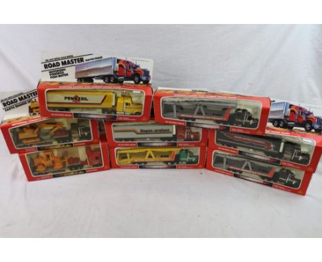 Eight boxed die cast MC TOY Road Master push-release tractor-trailer models including Earth Shaker set, Pennzoil, Trans-Ameri