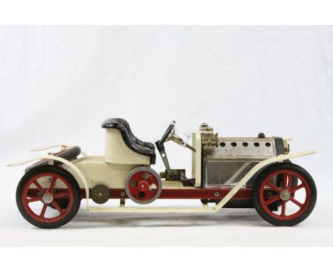 Mamod Roadster steam engine in white, rusting and grubby but fair condition