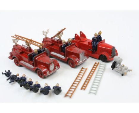 Three diecast fire engines to include Charbens x 2 and Crescent, with fireman figures, all three showing paint loss